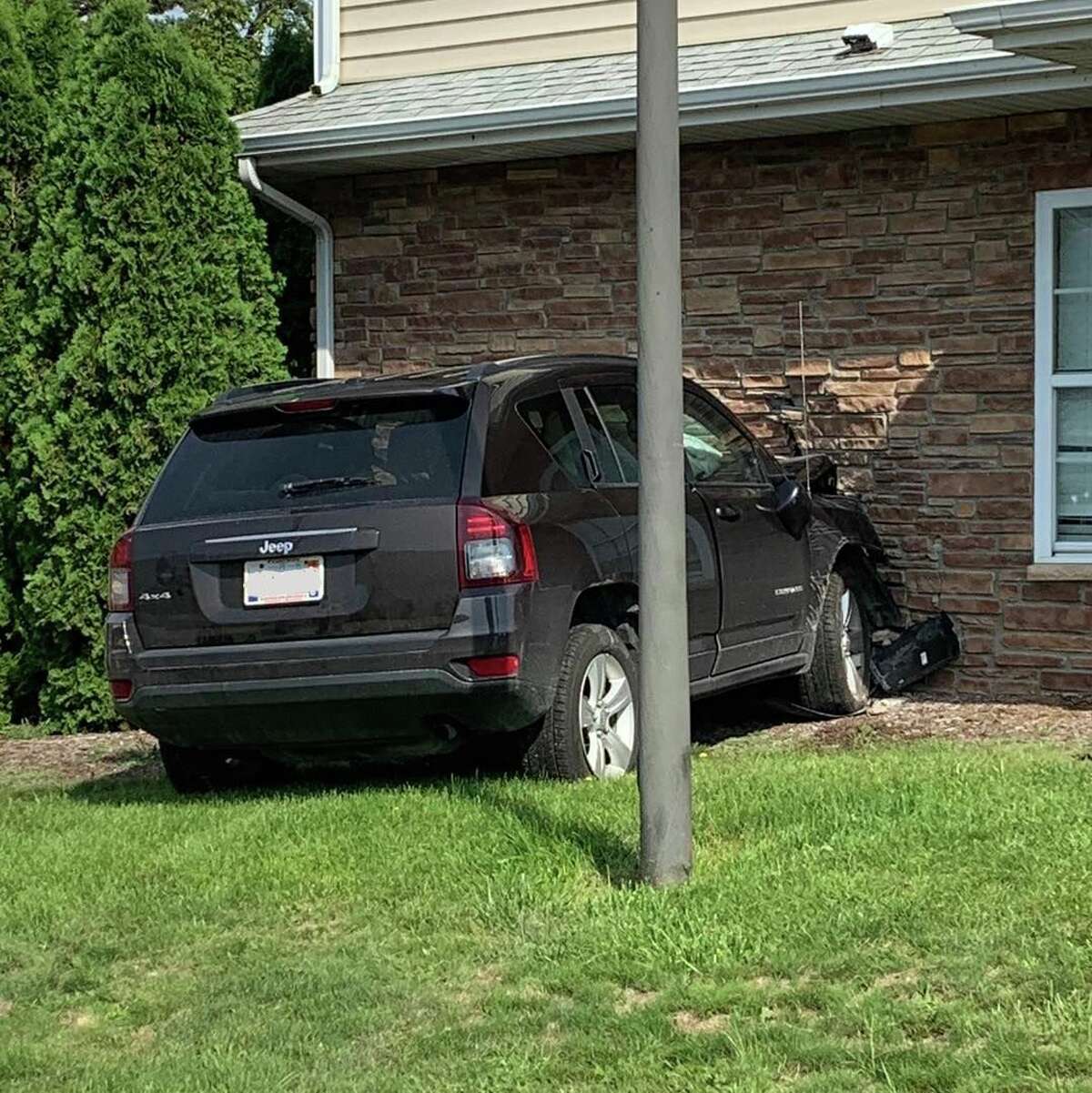 A 2014 Jeep SUV left the road and crashed into the side of Gateway Village after being struck by another driver who failed to yield turning onto Forest Avenue on Aug. 26.  