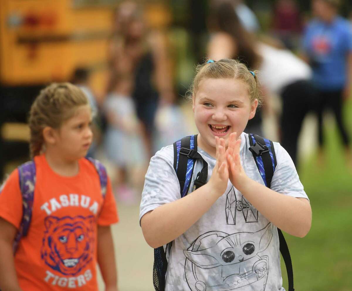 Happy students return for the first day of school at Tashua Elementary School in Trumbull, Conn. on Tuesday, August 30, 2022.