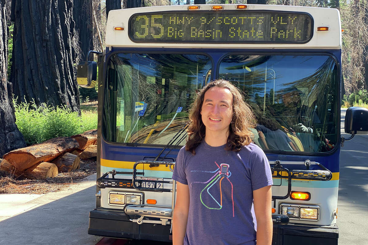 Hayden Miller stands in front of the 35 bus at Big Basin Redwoods State Park. 