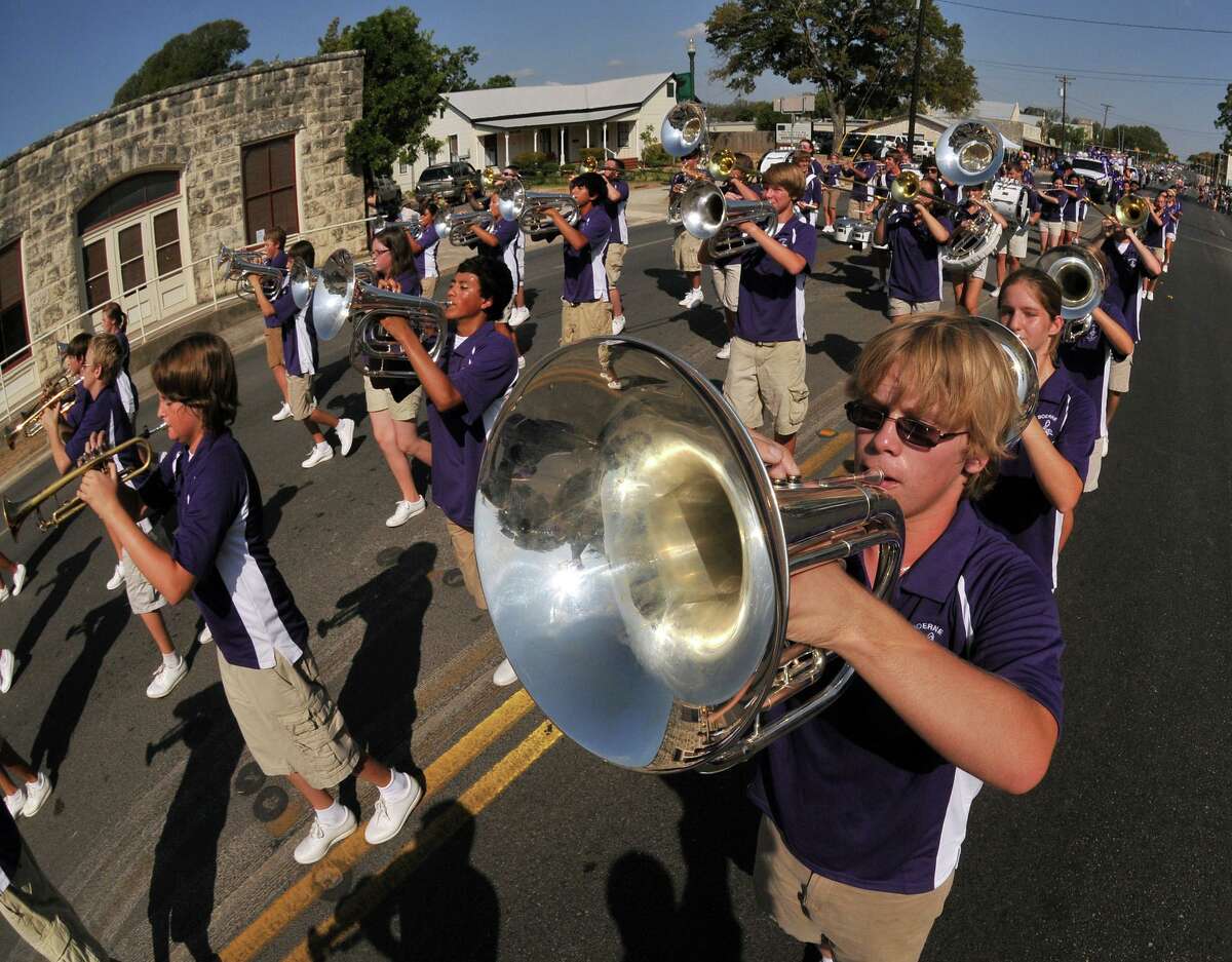 The Boerne High School marching band makes its way along Main Street during the 2011 Kendall County Fair parade.