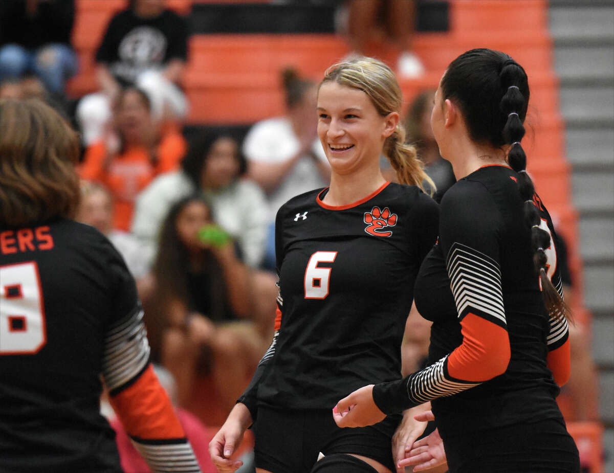 Edwardsville's Vyla Hupp celebrates after a kill in the first set against O'Fallon on Tuesday inside Lucco-Jackson Gymnasium in Edwardsville.