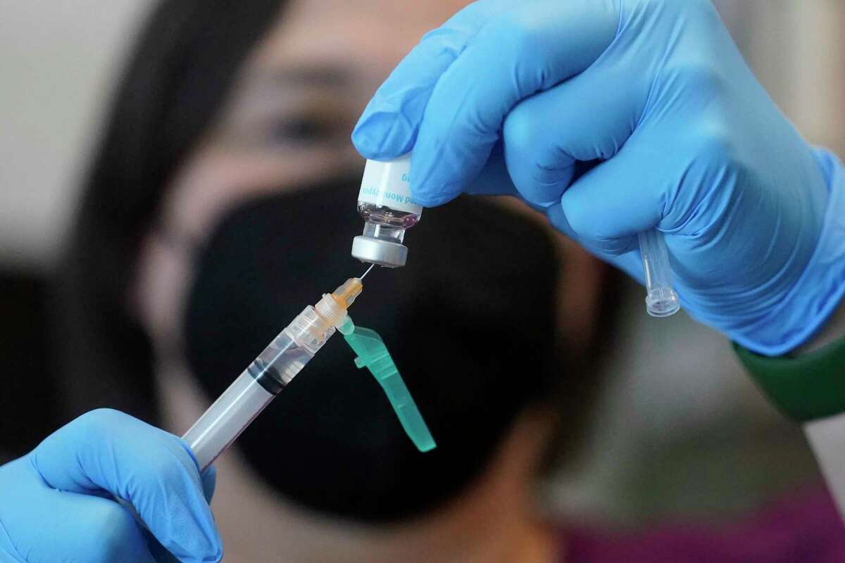 A nurse prepares a dose of a monkeypox vaccine at the Salt Lake County Health Department in Salt Lake City on July 28, 2022.