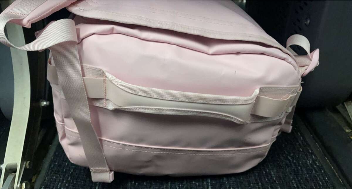 While it was a tight fit under the seat on United, the Go Bag Mini fit perfectly under the seat on JetBlue.