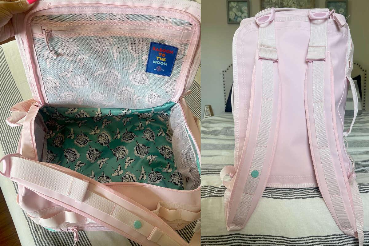 The true brightness of the pink does not seem to photograph well, but the interior print of this bag is the true design star.