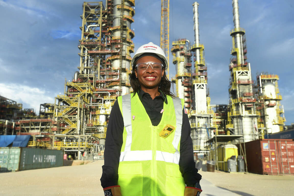 ExxonMobil Beaumont refinery manager Rozena Denby stands in front of the new BLADE unit, which is scheduled to go online in the first quarter of 2023. Construction began in 2019 on the $2 billion project, which utilizes the most advanced technology in heat integrated facilities to reduce emissions and environmental impact. The medium sized refinery will primarily produce diesel fuel and adds 250,000 barrels a day of crude oil to the Beaumont plant's current production volume of roughly 366,000 barrels per day. Photo made Monday, August 29, 2022 Kim Brent/Beaumont Enterprise