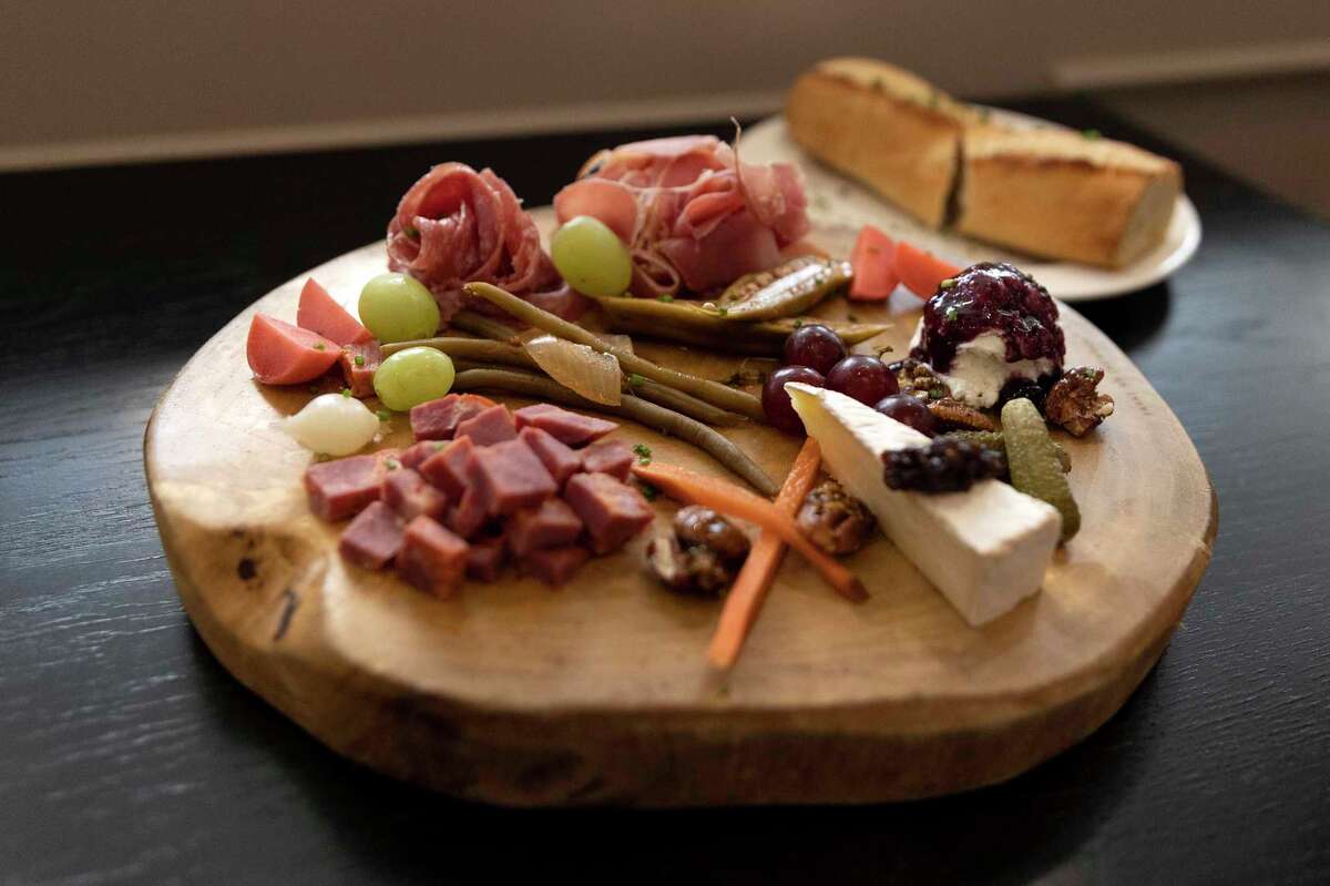 A charcuterie board is on the menu at Maverick Whiskey, a downtown distillery, restaurant and brewery.