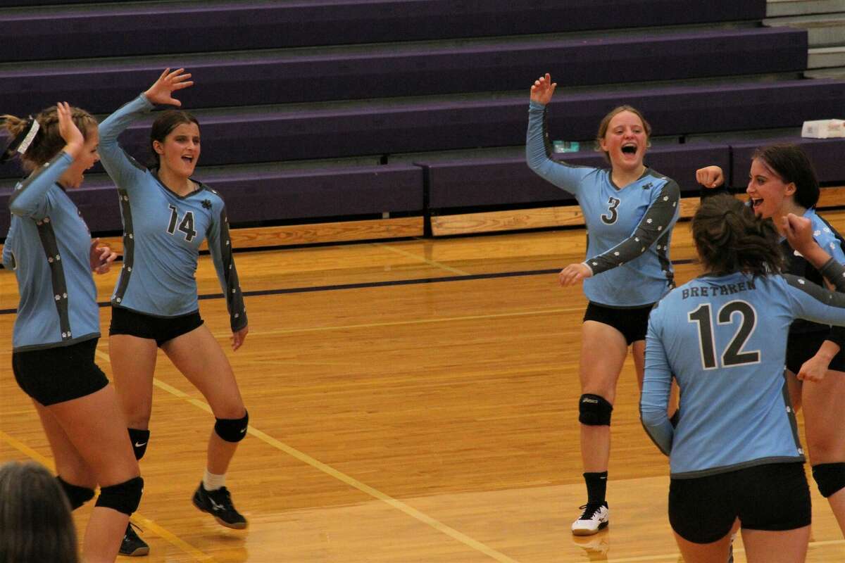 The Brethren volleyball team celebrates a point during a match against Frankfort on Aug. 30 at Frankfort High School. 