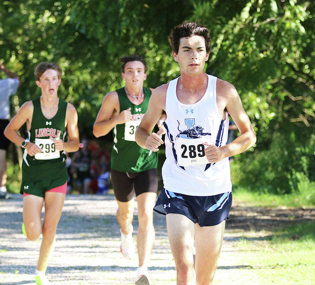 Jersey's Griffin Williams leads a pair of Lincoln Railers on Tuesday in the Carlinville Early Meet at Loveless Park. Williams finished fourth in the race.