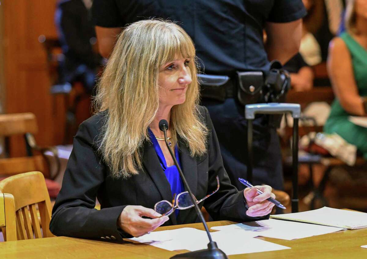 Schoharie County District Attorney Susan Mallery listens as Judge Peter Lynch, rejects a plea agreement for Nauman Hussain to avoid prison time during a proceeding for Nauman Hussain, who ran the limo company involved in the 2018 crash in Schoharie that killed 20 people, Schoharie County court Wednesday, Aug. 31, 2022, in Schoharie, N.Y. (AP Photo/Hans Pennink)