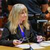 Schoharie County District Attorney Susan Mallery listens as Judge Peter Lynch, rejects a plea agreement for Nauman Hussain to avoid prison time during a proceeding for Nauman Hussain, who ran the limo company involved in the 2018 crash in Schoharie that killed 20 people, Schoharie County court Wednesday, Aug. 31, 2022, in Schoharie, N.Y. (AP Photo/Hans Pennink)