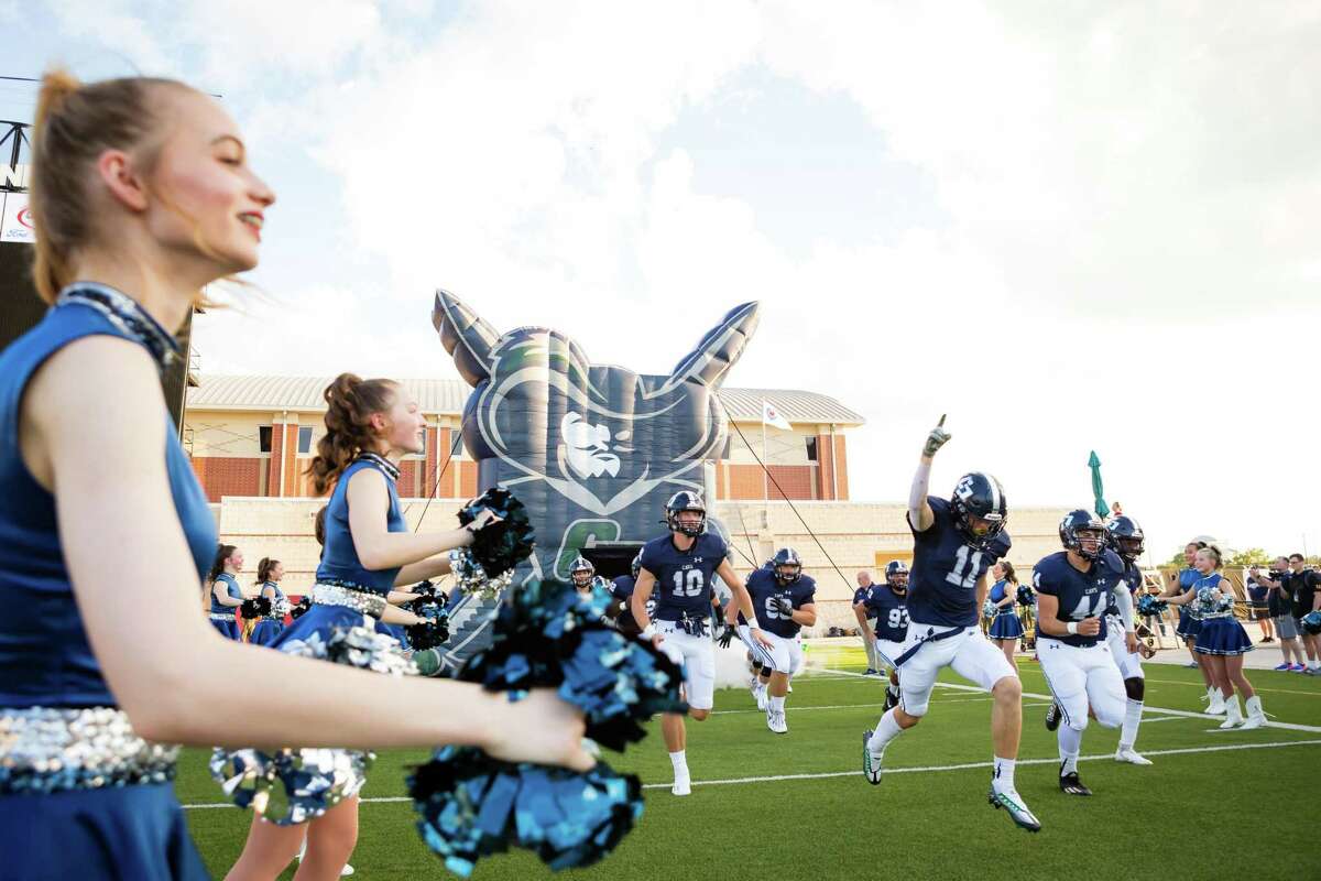 College Park runs onto the field before a high school football game Thursday, Aug 25, 2022, in Shenandoah.