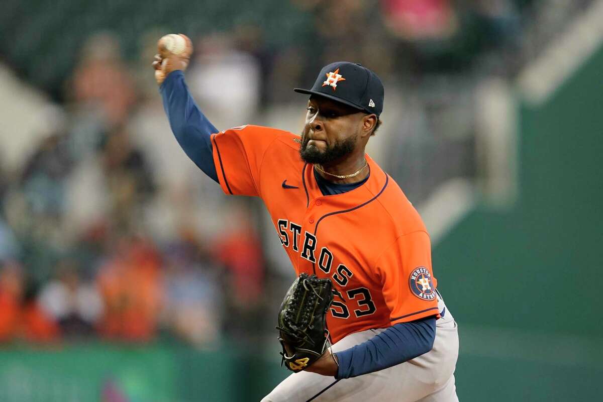 Houston Astros starting pitcher Cristian Javier throws to the Texas Rangers in the first inning of a baseball game in Arlington, Texas, Wednesday, Aug. 31, 2022. (AP Photo/Tony Gutierrez)
