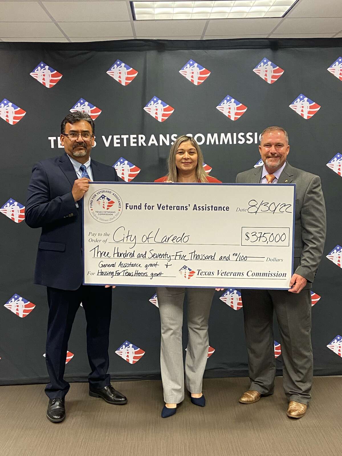 James Bracken, who is the director of Fund for Veterans' Assistance (right), Elsa Hinojosa, who is the community development programs administrator (center) and Humberto Delgado, City of Laredo municipal housing manager on the left. The three local organizations from Webb County and the city received grant money totaling $825,000 as the donations were provided to the Webb County Veteran Services organization, the Webb County 406th District Court and the City of Laredo as well. 