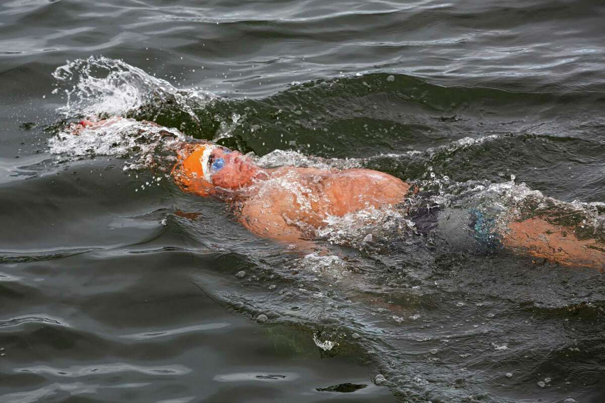 Duke Dahlin, member of the Dolphin Swimming & Boating Club, swims at Aquatic Park on August 31, 2022. San Francisco, Calif.