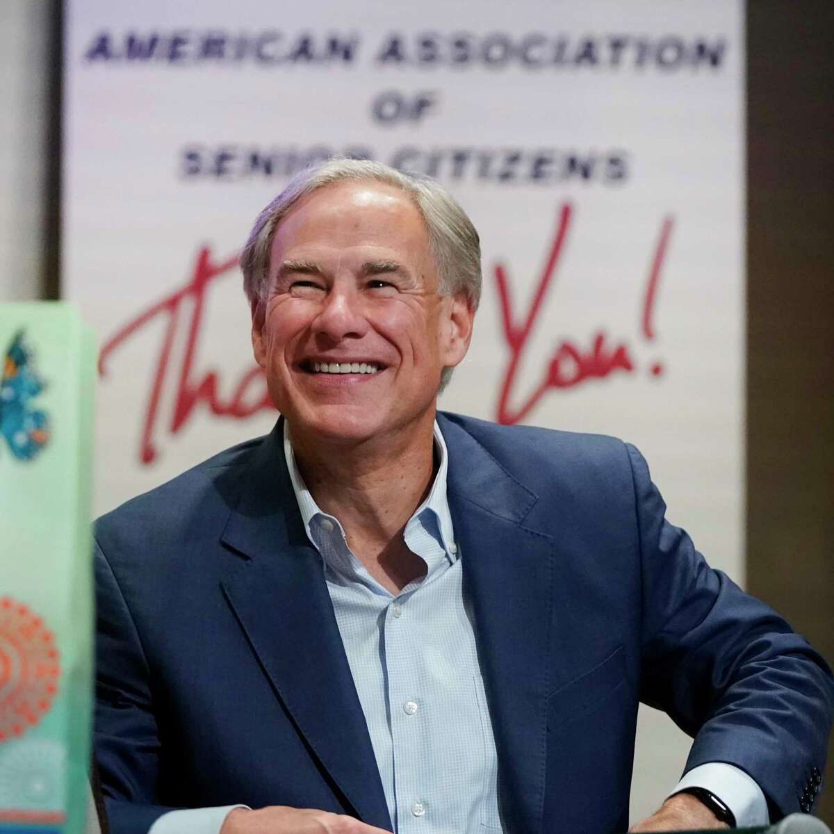 Texas Governor Greg Abbott is pictured onstage at the Republican Club at Heritage Ranch monthly meeting in Fairview, Texas. CREDIT: Louis DeLuca for The Houston Chronicle