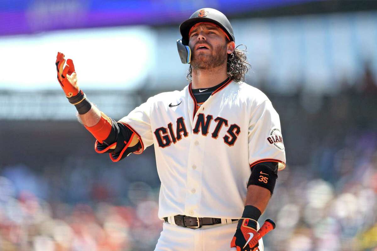 Giants shortstop Brandon Crawford reacts to striking out in the second inning against the Padres’ Joe Musgrove. Crawford was ejected that inning