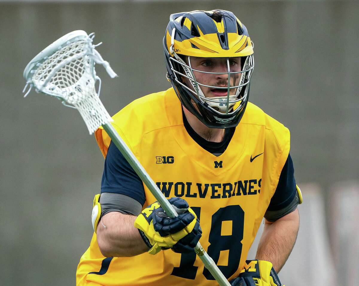 Wilton's Ryan Schriber (18) in action for the Michigan men's lacrosse team on Feb. 22, 2022.