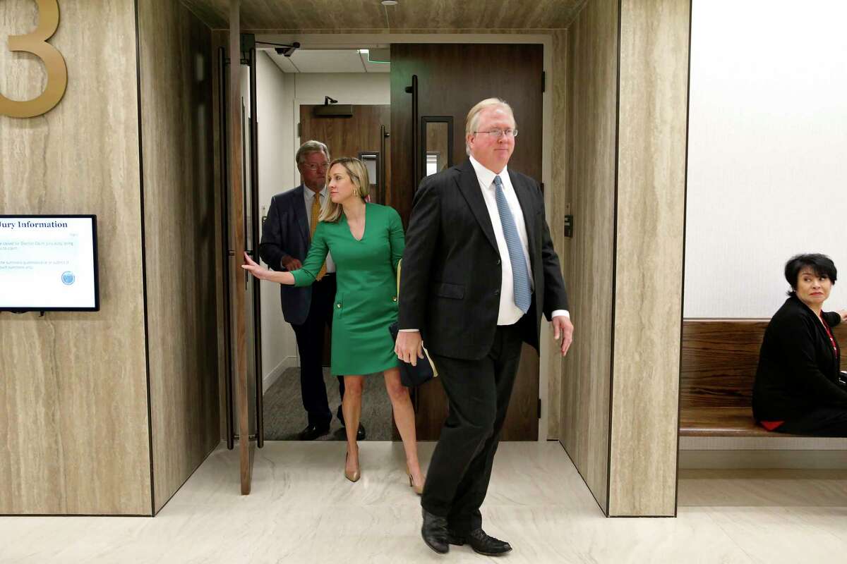 Graham Weston leaves the Comal County District Court in New Braunfels after an Aug. 26 pre-trail hearing in the divorce case brought by Elizabeth Weston. With him are his attorneys, William Ford and Veronica Wolfe.