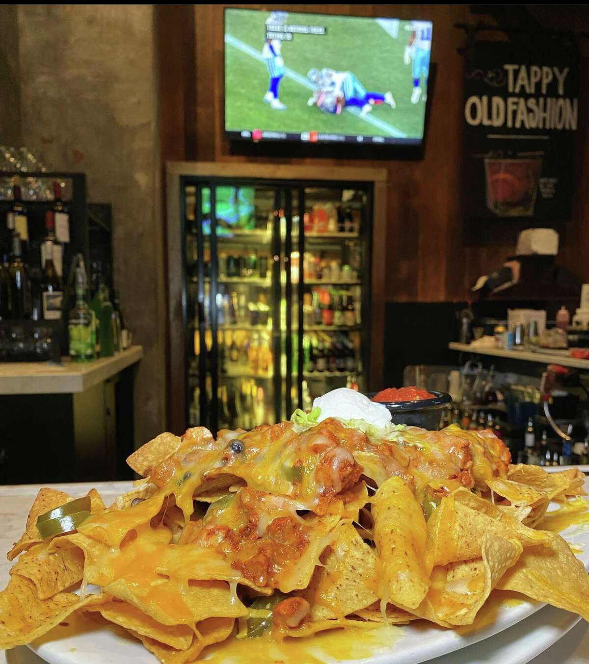 Wood-n-Tap offers football specials as the NFL season starts, including $10 chicken or beef nachos.