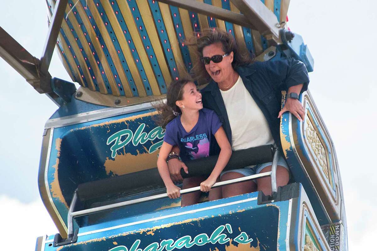 Addyson Niegoda, 9, of Petersburgh rides the Pharaoh’s Fury ride with her grandmother Susan Danskin of Averill Park at the Schaghticoke Fair on Thursday, Sept. 1, 2022 in Schaghticoke, N.Y.