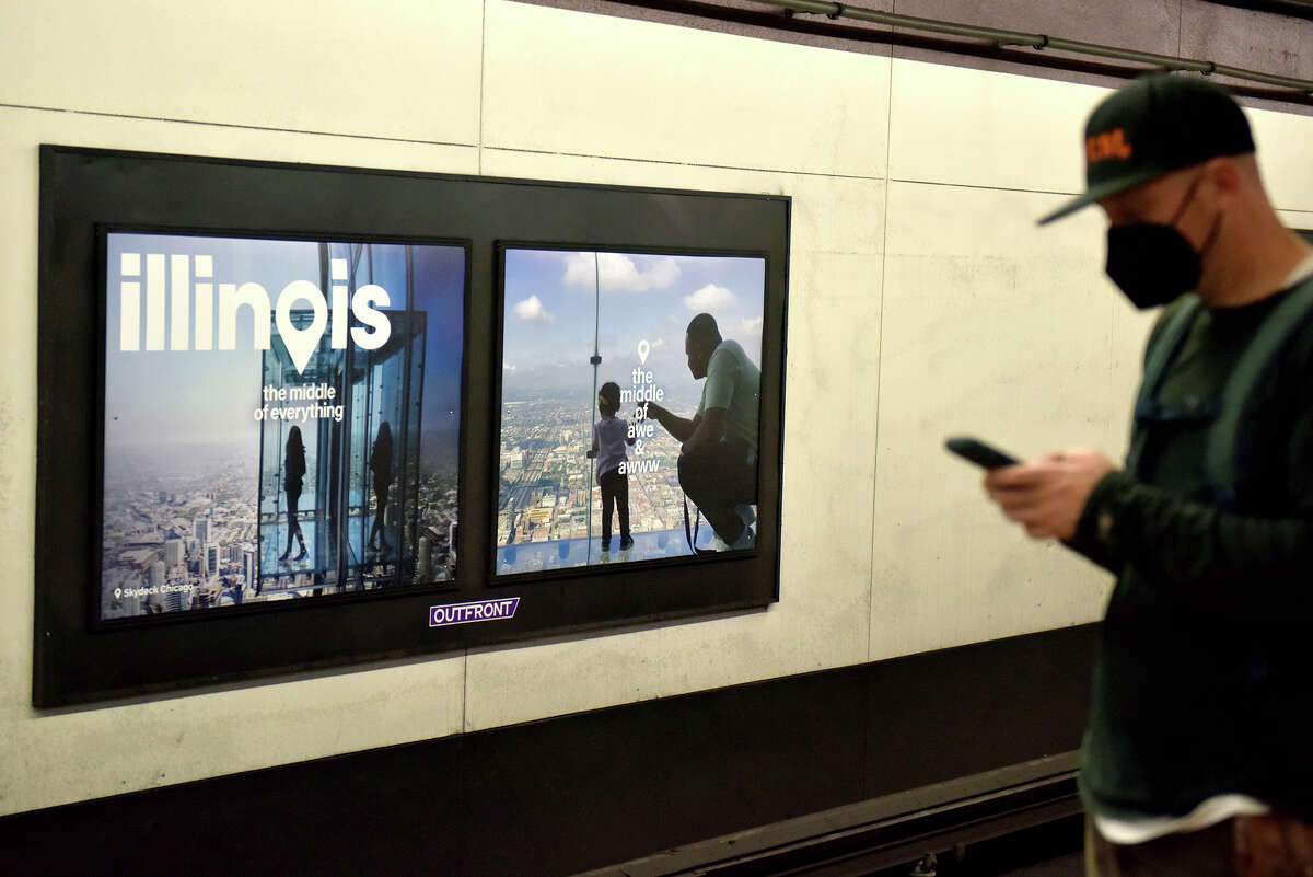 A commuter waits for a BART train to arrive at Montgomery station on Tuesday.