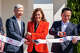 SK Siltron CSS CEO Jianwei Dong (left), Michigan Gov. Gretchen Whitmer (center) and SK Siltron CEO Jang Yong Ho cut a ribbon for a new SK Siltron CSS plant on Sept. 1, 2022 in Bay County.
