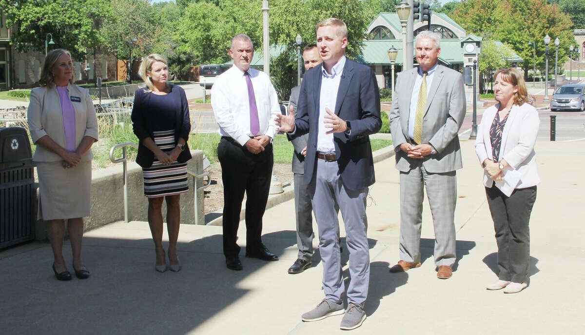 State Rep. Tom Demmer, R-Dixon, the Republican candidate for state treasurer, speaks during a campaign stop at the Madison County Courthouse Wednesday afternoon while flanked by state legislative candidates and Republican county officeholders and candidates. Demmer criticized the Democrats on fiscal issues.