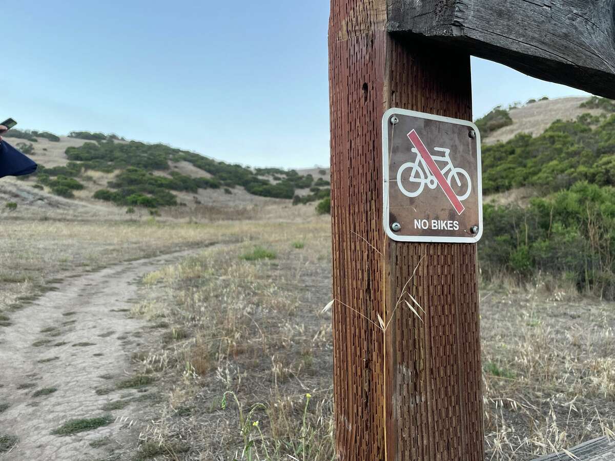 A sign seen in Windy Hill Preserve, a preserve under Midpeninsula Regional Open Space District's jurisdiction.?
