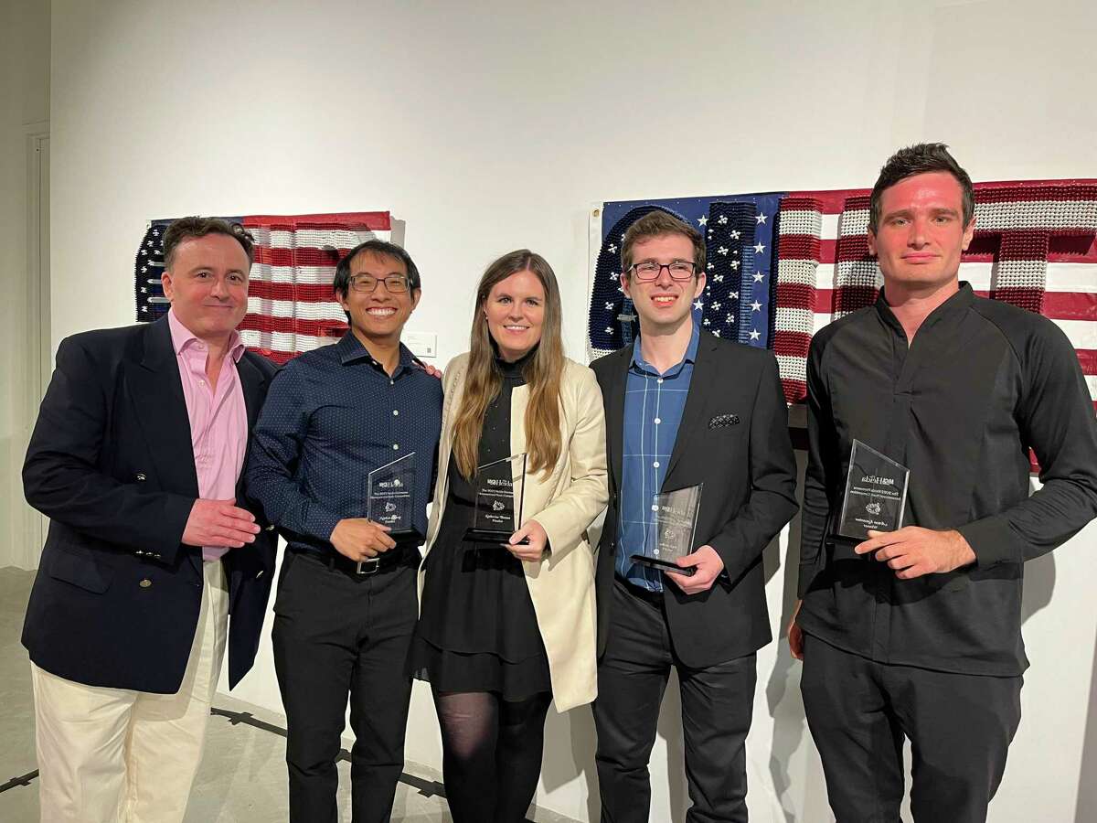The three-day Heida Hermanns International Piano Competition recently culminated at MoCA Westport with an awards ceremony, in which Russian-born Artem Kuznetsov was named the winner. Pictured left to right are: Alexander Platt with the four competitors - Nathan Cheung, Katharine Bensen, Aaron Kurz and Artem Kuznetsov.