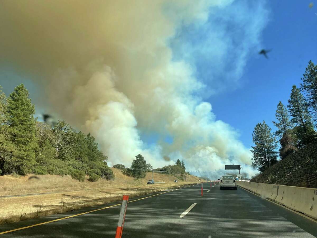 The Walker Fire near Willits was around 25 acres by early Thursday evening, forcing evacuation warnings and a partial closure of Highway 101.