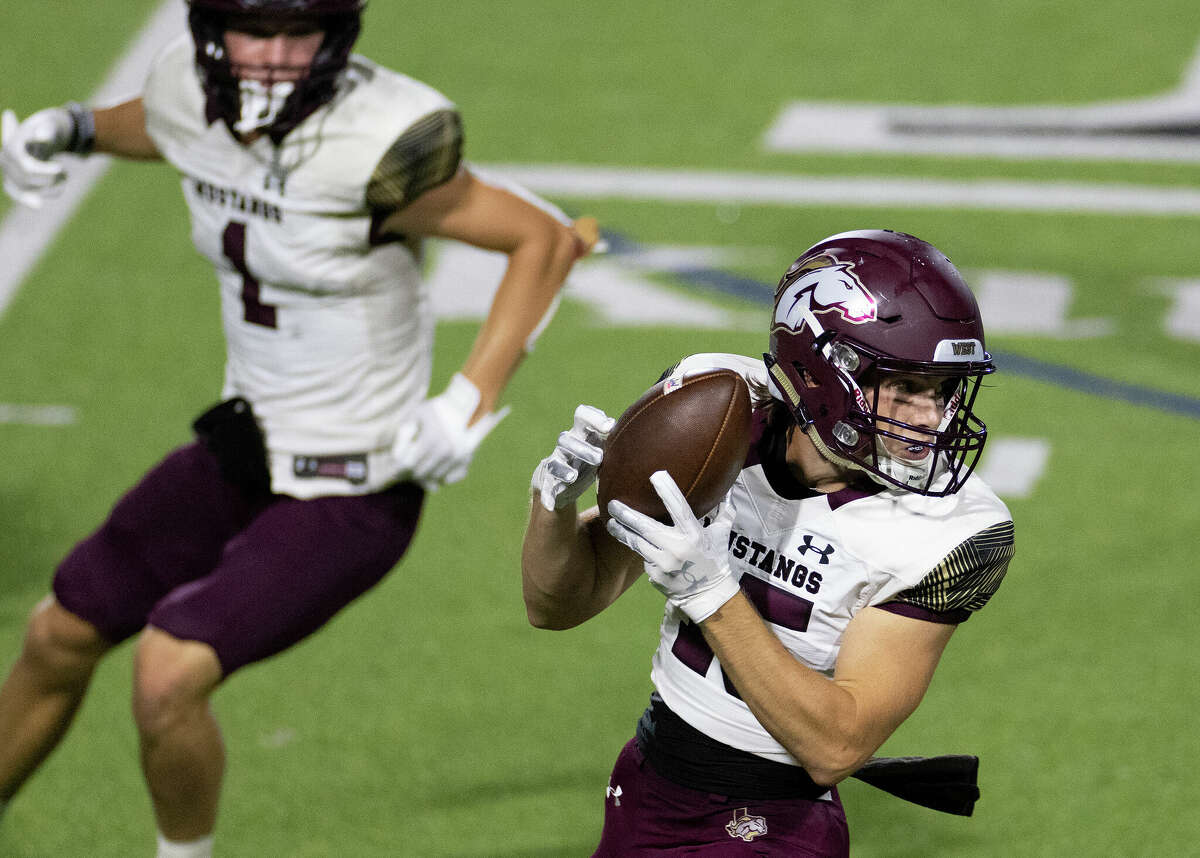 Magnolia West Joe Johnson (15) runs after the catch against the Magnolia West in the second half on September 1, 2022 at Legacy Stadium in Katy, Texas. Magnolia won 43 to 0.