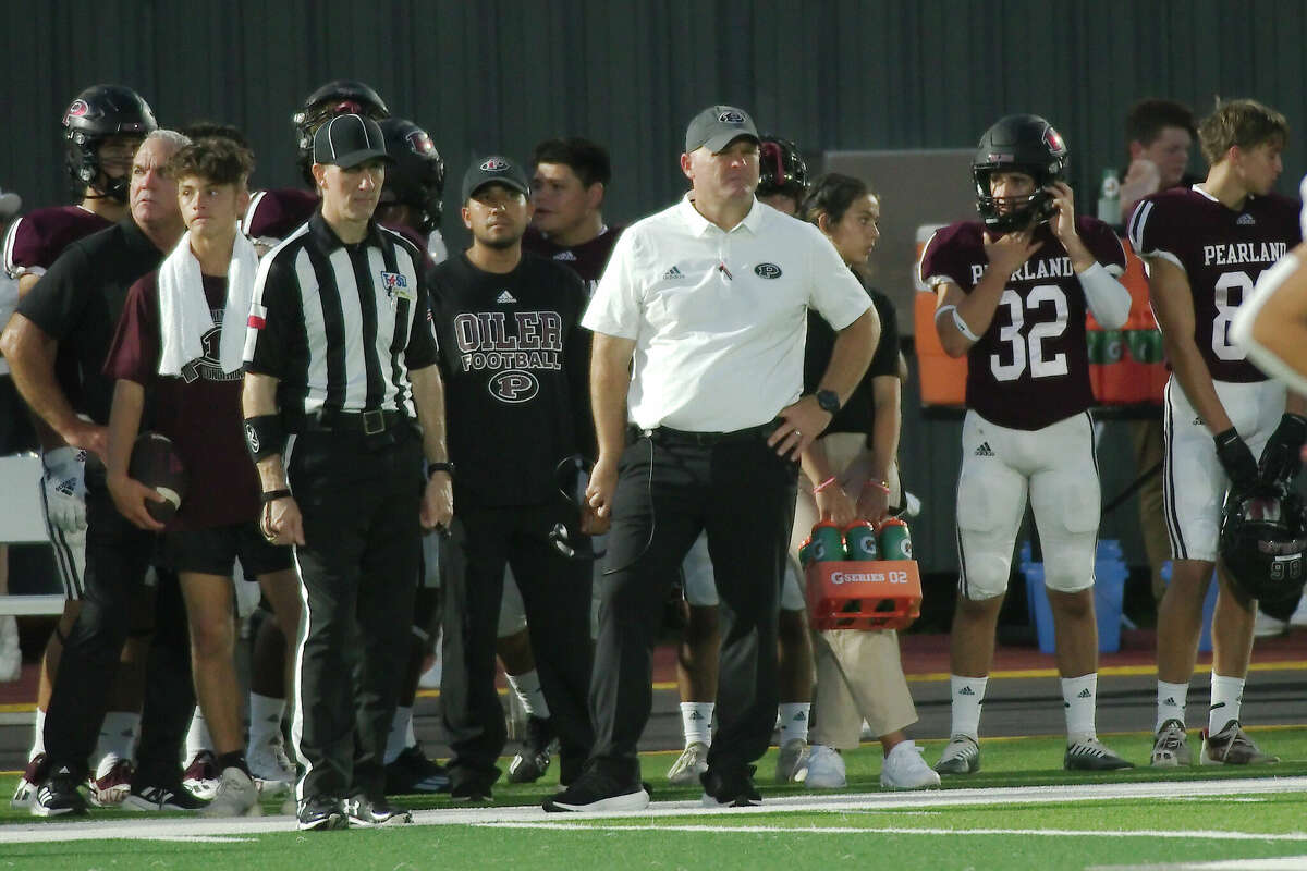 Pearland football coach BJ Gotte walks the sideline in the game against Spring Branch Memorial Thursday, Sep. 1, 2022 at The Rig in Pearland.
