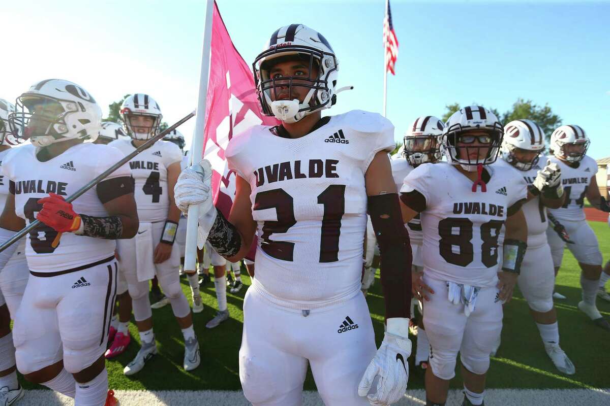 Uvalde football wins 1st home game after surprise visit from Houston Texans  - ABC News