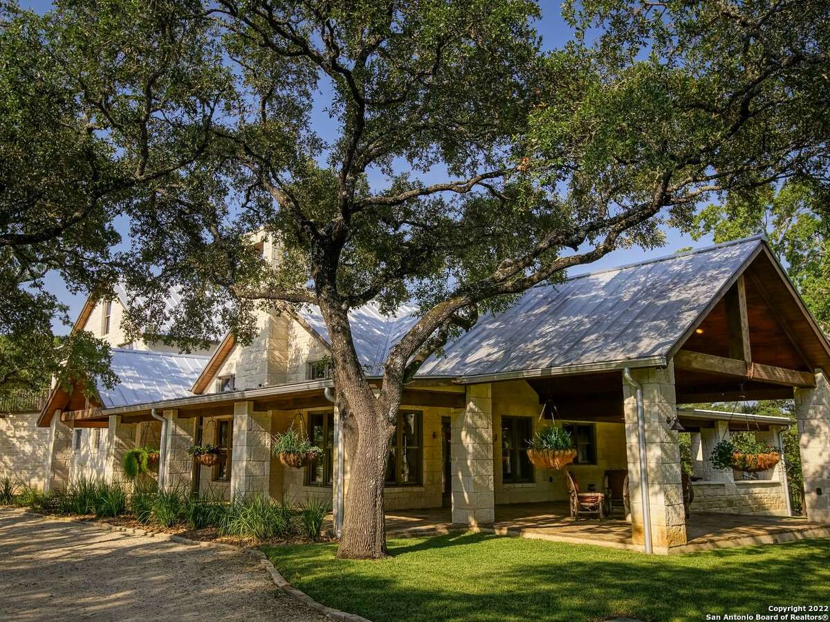 The property oat 35 Old San Antonio Rd. sits on 14.1 acres and includes two homes — one of which is a renovated 1890s era structure. The other is a 5,353-square-foot home with interior rock walls, four bedrooms, three full bathrooms and two partial bathrooms.