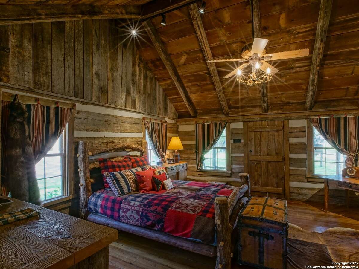 The property oat 35 Old San Antonio Rd. sits on 14.1 acres and includes two homes — one of which is a renovated 1890s era structure. The other is a 5,353-square-foot home with interior rock walls, four bedrooms, three full bathrooms and two partial bathrooms.