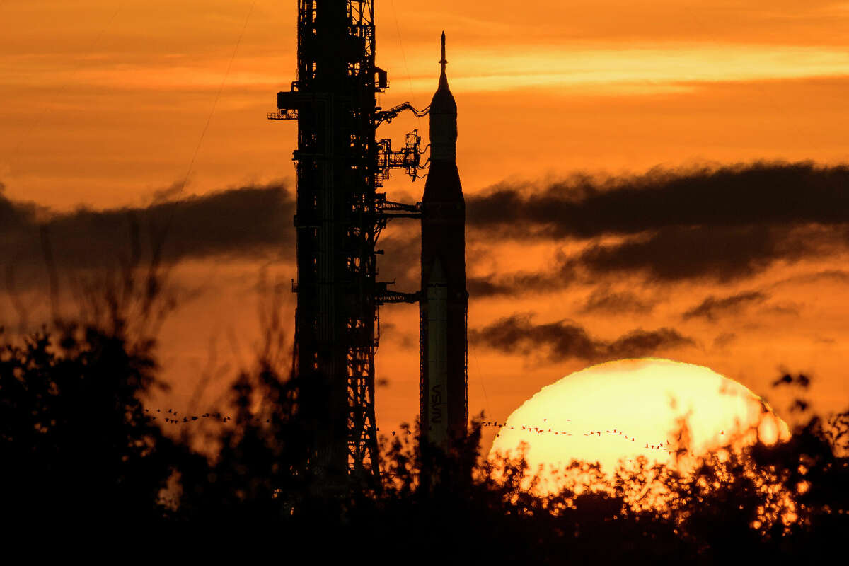 CAPE CANAVERAL, FLORIDA - AUGUST 31: In this handout image provided by NASA, NASA's Space Launch System (SLS) rocket with the Orion spacecraft aboard is seen during sunrise atop a mobile launcher at Launch Pad 39B as preparations for launch continue, at NASAs Kennedy Space Center, August 31, 2022 in Florida. NASAs Artemis I flight test is the first integrated test of the agencies deep space exploration systems: the Orion spacecraft, SLS rocket, and supporting ground systems. (Photo by Bill Ingalls/NASA via Getty Images)