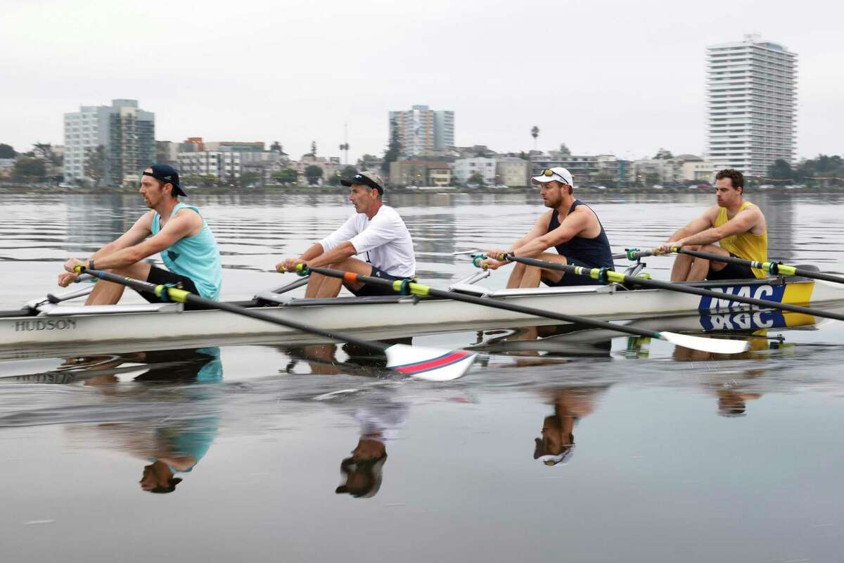 The Lake Merritt Rowing Club practices at Lake Merritt in Oakland, California on Friday, September 2, 2022. Toxic algae spreading across San Francisco Bay, killing thousands of fish, has caused concern for some water sports groups. They saw more class cancellations last month.
