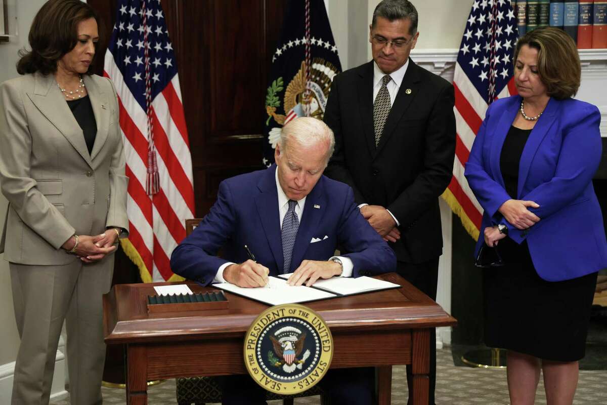 President Joe Biden signs an executive order in July. While U.S. Sen. John Cornyn recently criticized the president for governing like a king, a reader notes former President Donald Trump signed executive orders at a greater rate. Maybe Biden is slacking.
