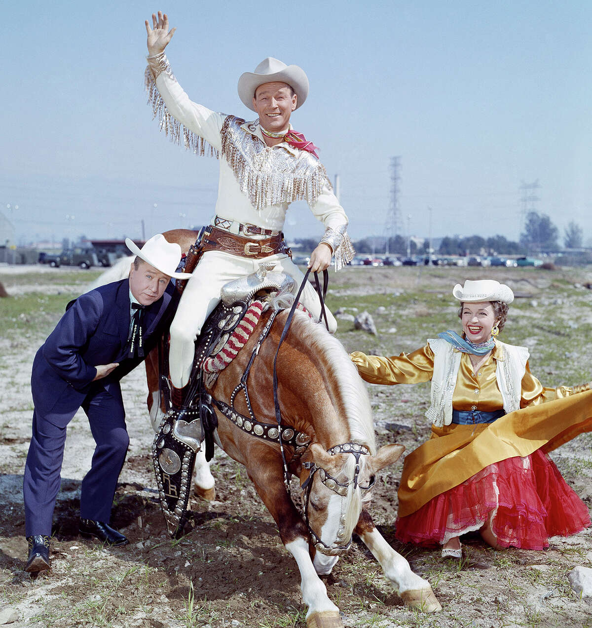 Roy Rogers on Trigger next to Dale Evans. In the early '50s, Rogers was a filming fixture in Kernville before it was flooded to become Lake Isabella.