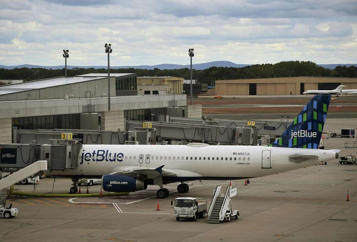 A JetBlue aircraft being serviced at Bradley International Airport in Windsor Locks, Conn. A new customer satisfaction study by J.D. Power ranks Bradley as below average in the medium sized airports category.