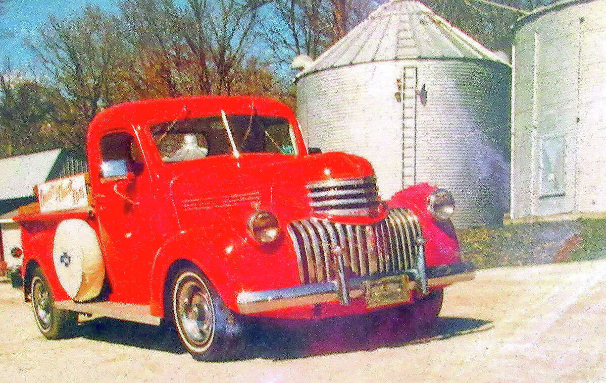 A 1946 Chevy pickup truck on the farm of Russ and Anita Noel was their inspiration for the logo for Country Classic Cars.