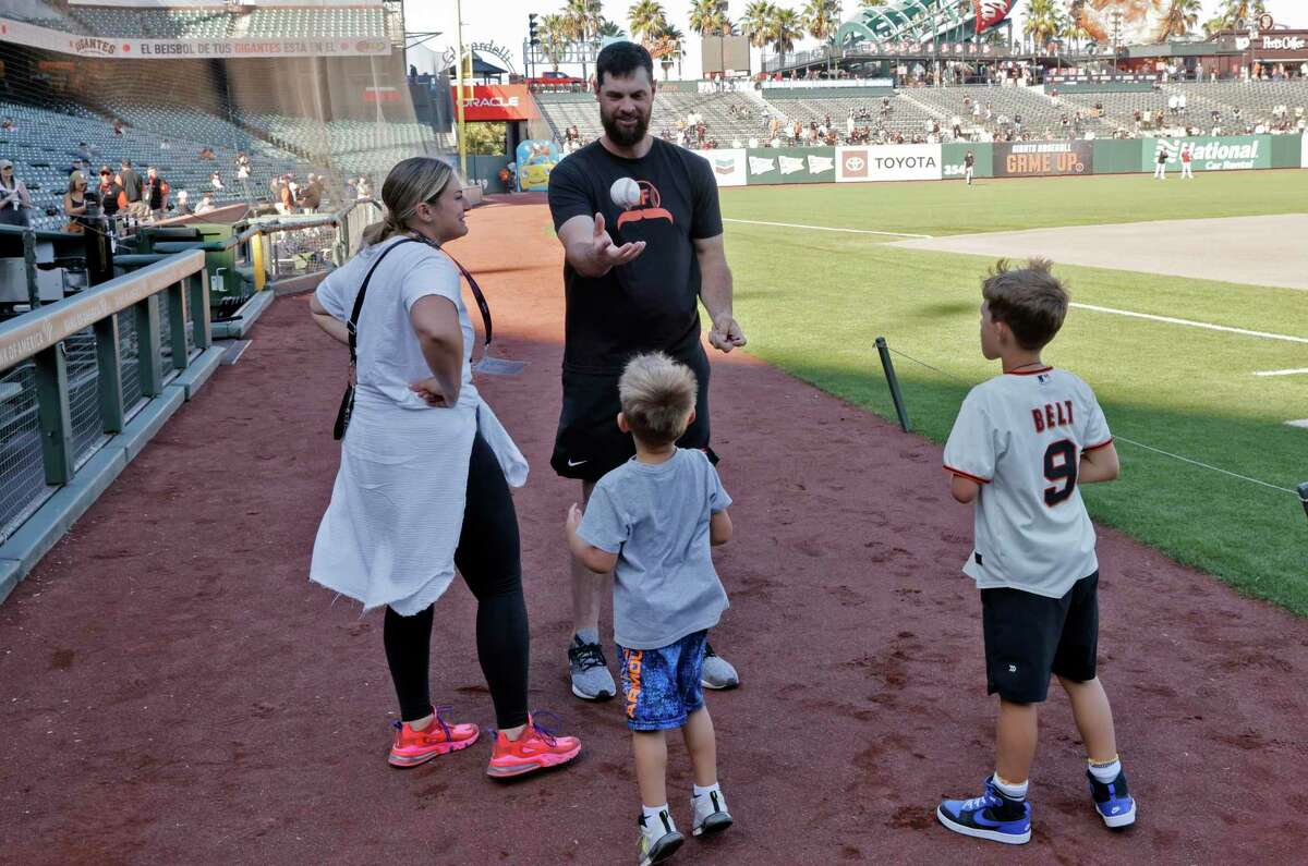 Brandon Belt enters Oracle Park on a boat, throws first pitch prior to  Giants' opener - Sports Illustrated