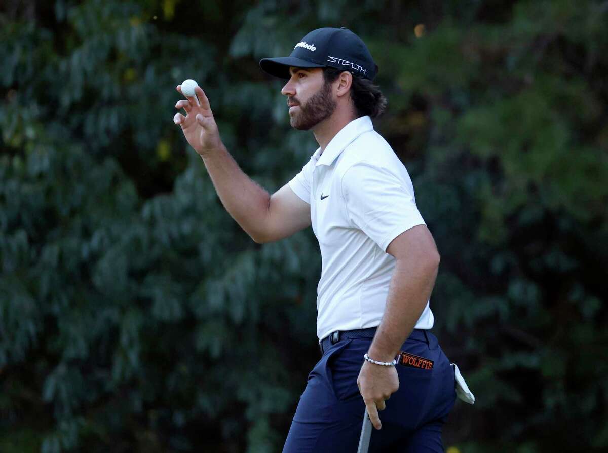 Matthew Wolff acknowledges fans after finishing his round on the 15th hole during the first round of the LIV Golf Invitational-Boston tournament Friday, Sept. 2, 2022, in Bolton, Mass. (AP Photo/Mary Schwalm)