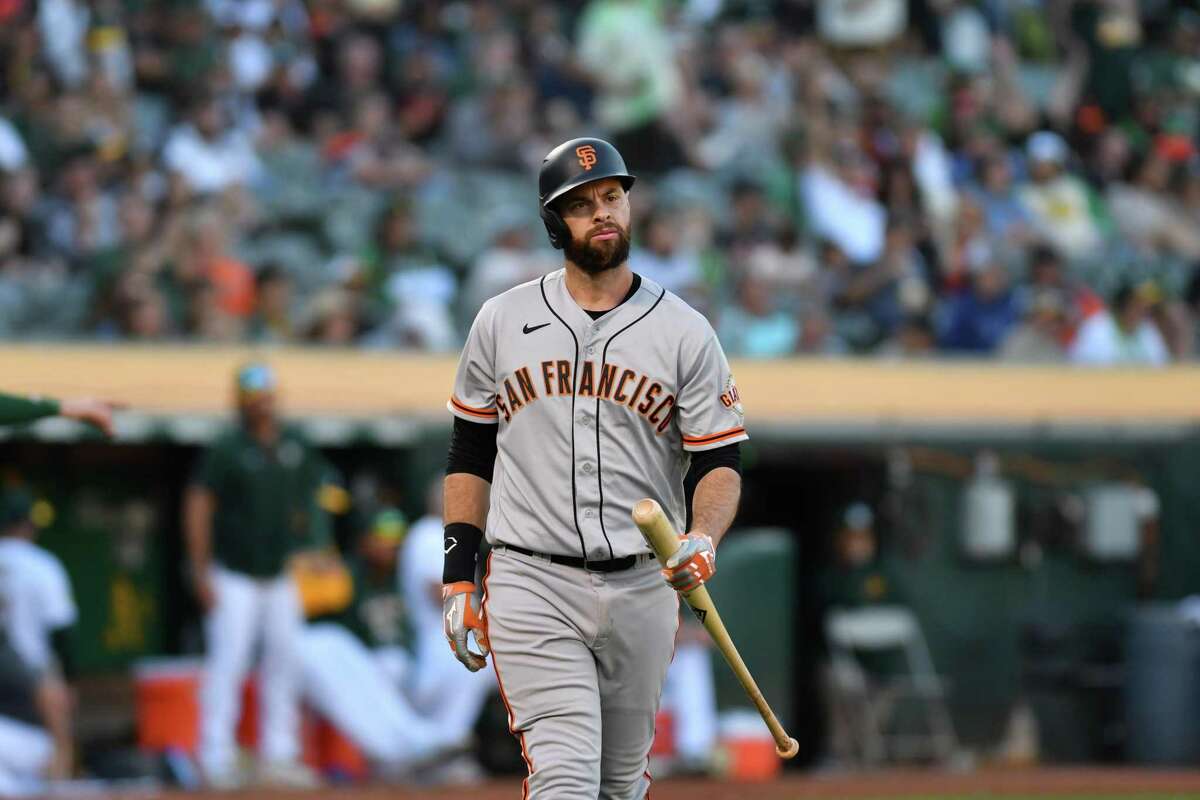 SAN FRANCISCO, CA - AUGUST 30: San Francisco Giants first baseman Yermin  Mercedes (6) waits between plays during the MLB professional baseball game  between the San Diego Padres and San Francisco Giants