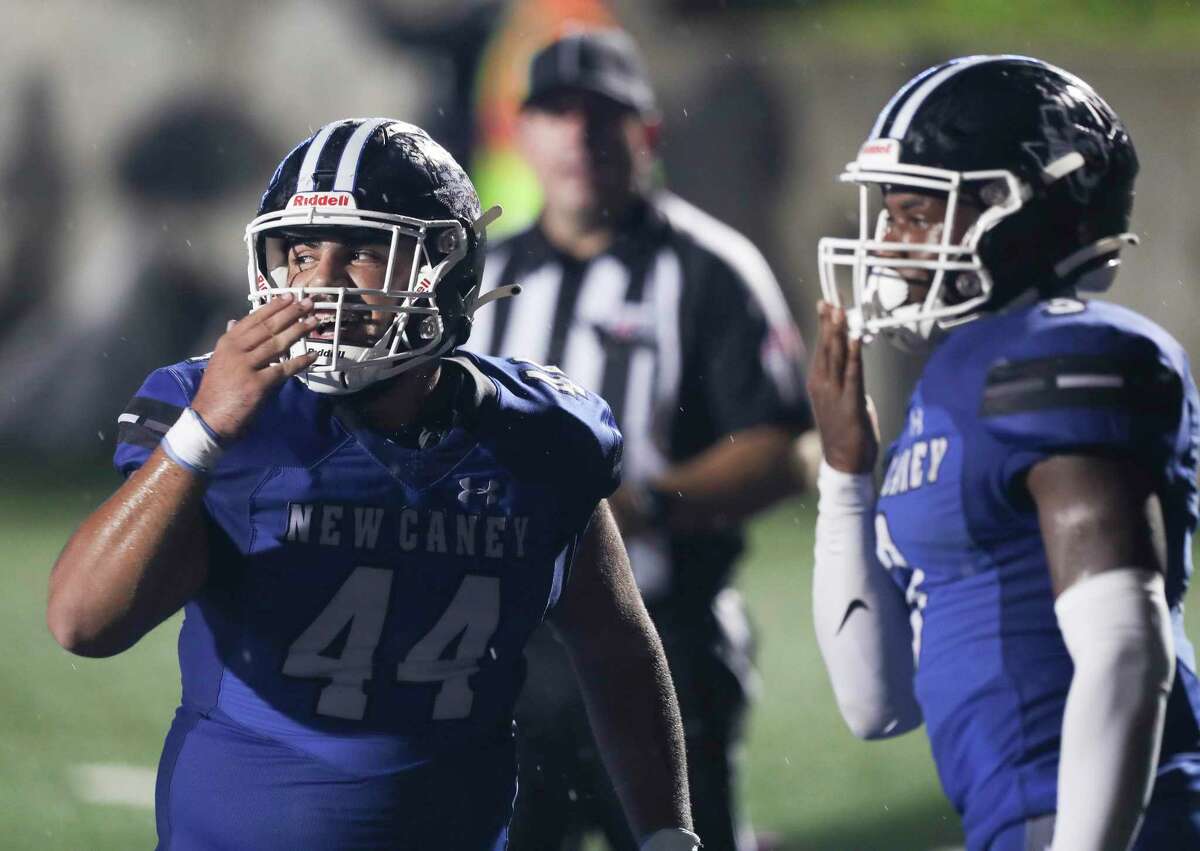 New Caney defensive tackle Tayte Baker (44) celebrates after a 1-yard touchdown run by running back Kedrick Reescano (3) in the second quarter of a non-district high school football game at Randall Reed Stadium, Friday, Sept. 2, 2022, in New Caney.