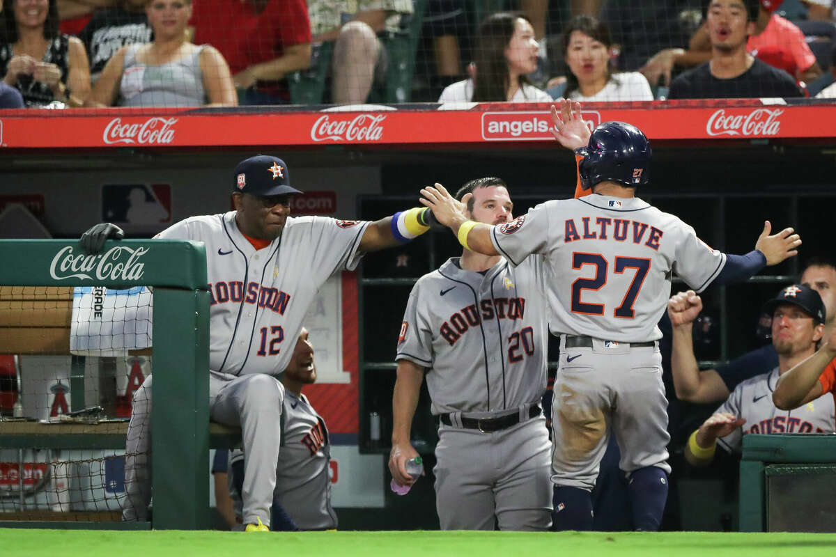 ANAHEIM, CALIFORNIA - SEPTEMBER 02: Jose Altuve #27 of the Houston Astros reacts after a run against the Los Angeles Angels in the third inning at Angel Stadium of Anaheim on September 02, 2022 in Anaheim, California. (Photo by Meg Oliphant/Getty Images)