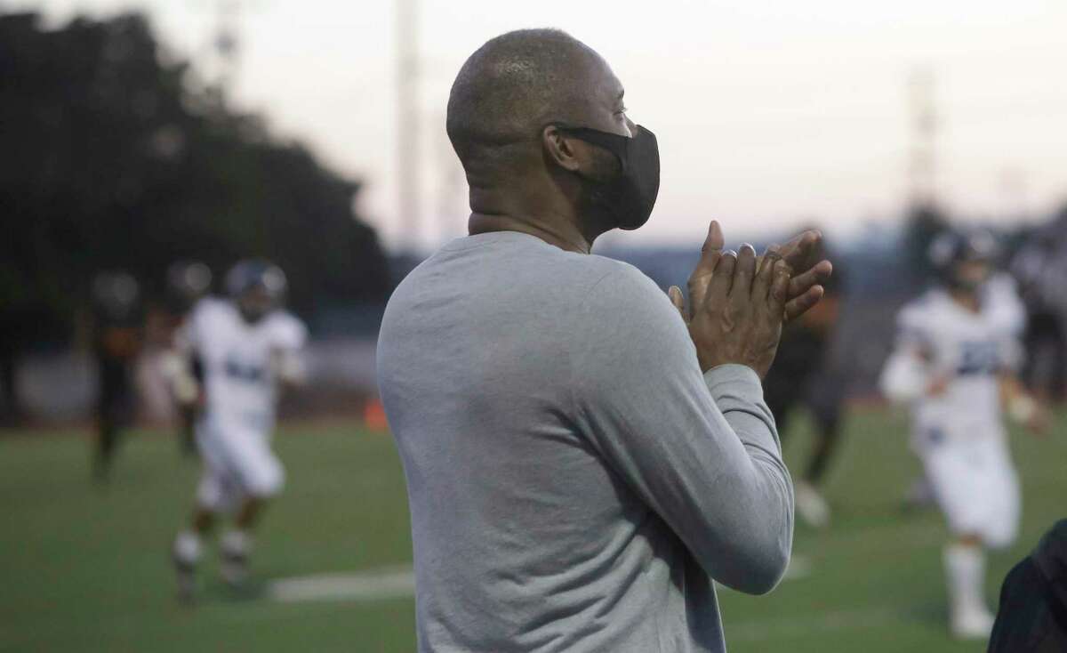 McClymonds alum Antonio Davis, who had a 13-year career in the NBA, watches his alma mater’s football team play Bellarmine on Friday night. Davis was one of several former Mack basketball players to attend a pregame ceremony honoring Hall of Famer Bill Russell.