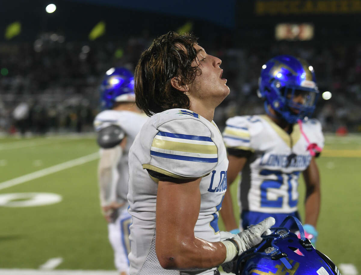 Hamshire-Fannett's John Sanderson comes to the sideline after making a big play. Photo made Friday, September 2, 2022 Kim Brent/Beaumont Enterprise