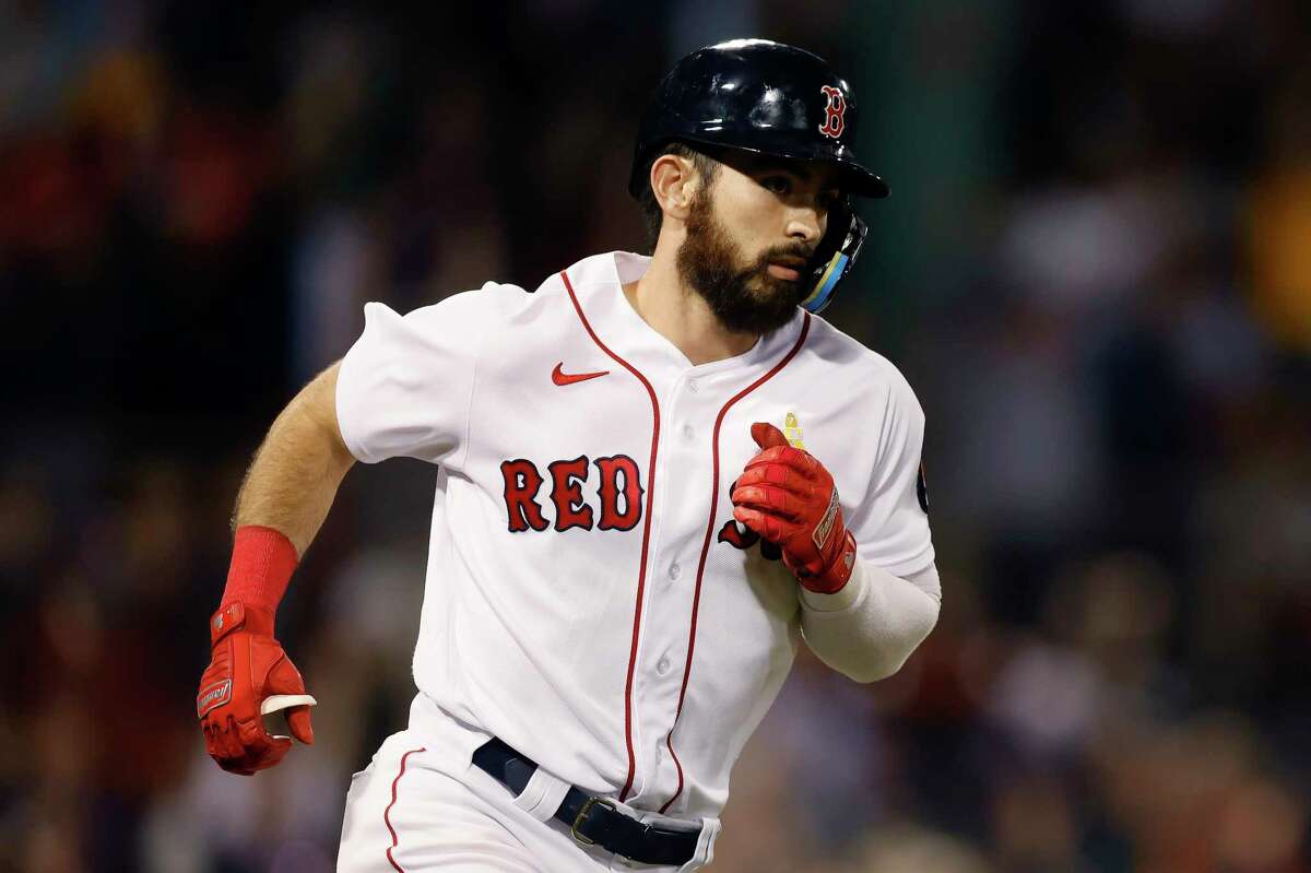 Boston Red Sox's Connor Wong runs on his two-run home run during the seventh inning of a baseball game against the Texas Rangers, Friday, Sept. 2, 2022, in Boston. (AP Photo/Michael Dwyer)