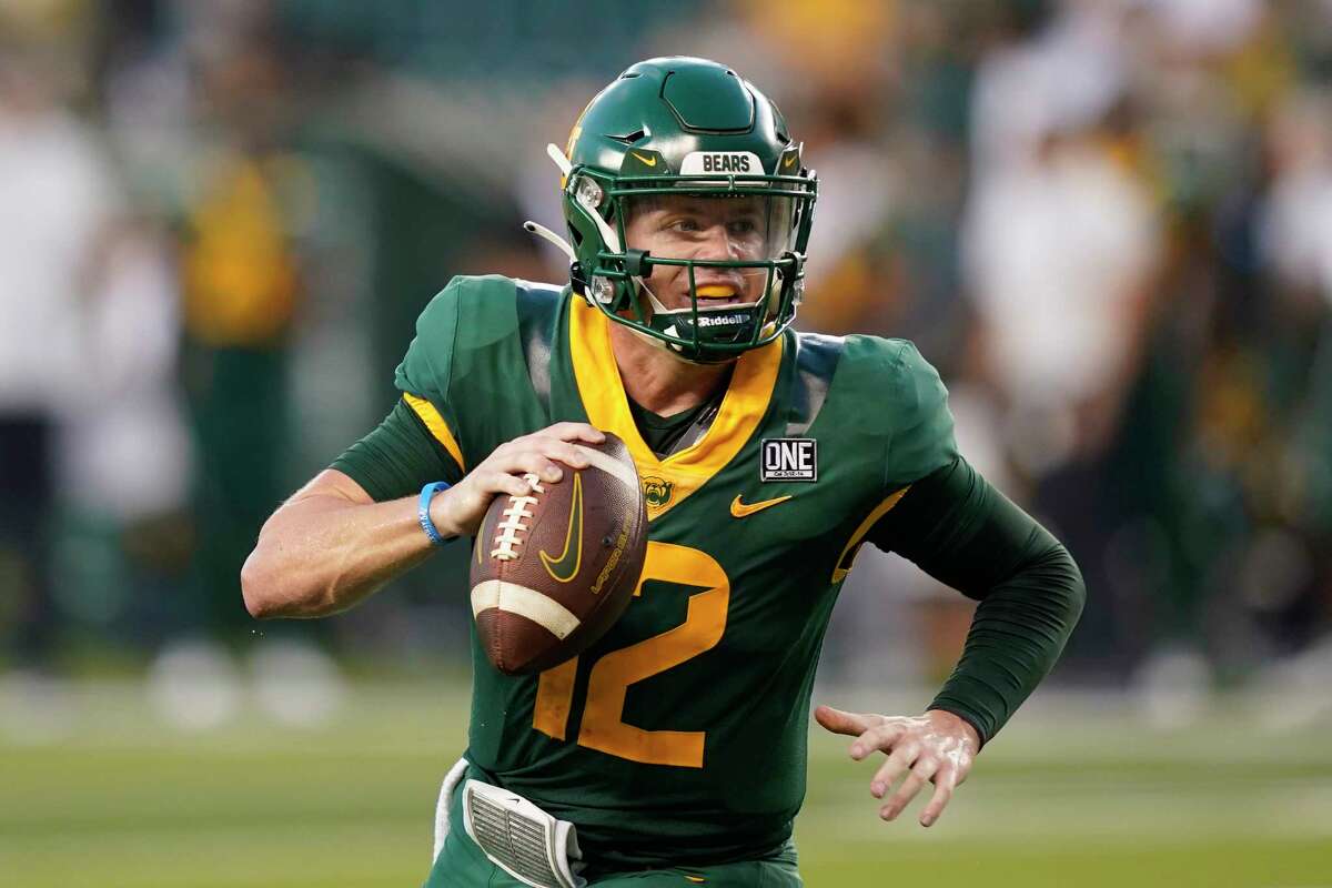 Baylor quarterback Blake Shapen looks to pass as he runs to score a touchdown against Albany during the first half of an NCAA college football game in Waco, Texas, Saturday, Sept. 3, 2022.
